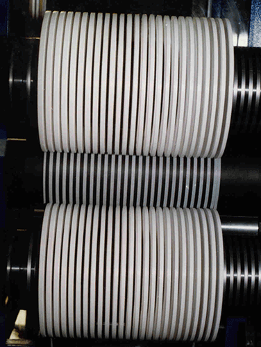 Narrow slitter for filtration fabric