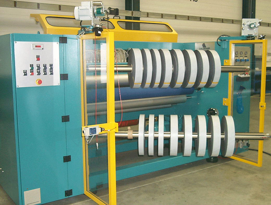 Vega centre winding slitter rewinder with swingable arms