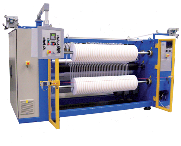 Vega slitter rewinder for filtration fabrics